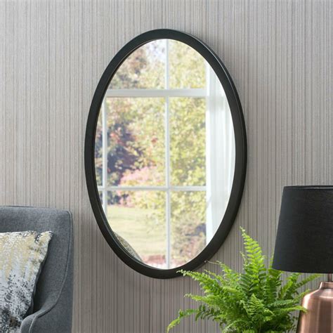 black oval wall mirror